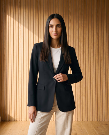 Graciela Cinch Waist Blazer in black — single-button cinch-waist blazer, front styling view on model