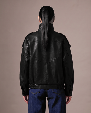 Hallie Funnel Jacket in black — back view showing the shoulder seams and hem