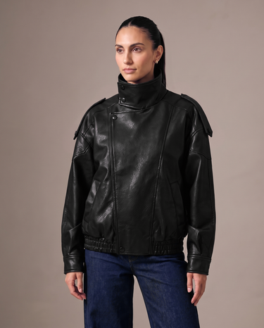 Hallie Funnel Jacket in black — front view worn by a model, showing the funnel collar and cropped boxy fit
