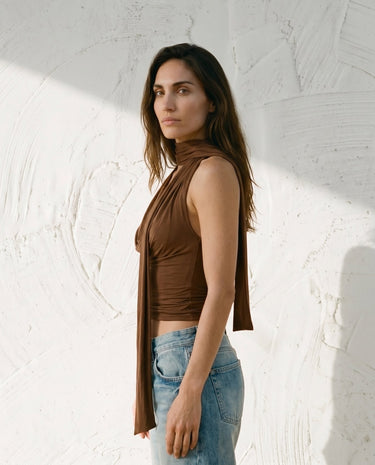 Brown draped halter top on model, scarf tie detail – Moriel Heritage