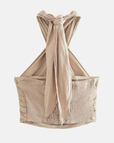 Beige linen halter crop top back flat lay showing the neck ties and shirred back panel – Moriel Heritage