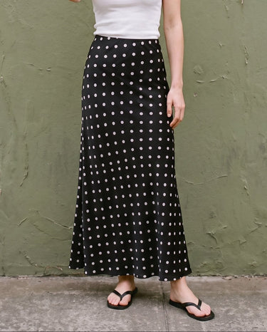 Hattie Polka Dot Skirt in black — front view on model