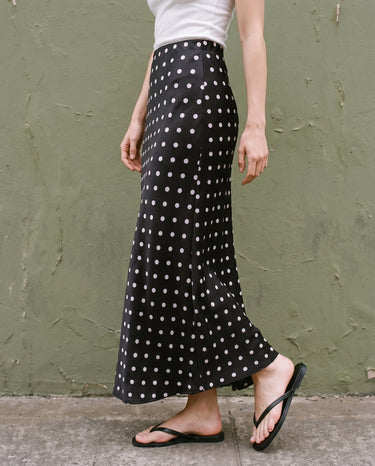Hattie Polka Dot Skirt in black — side view on model