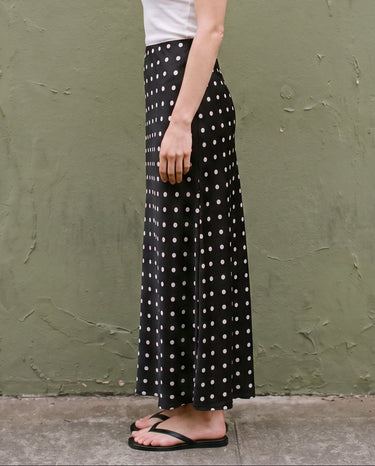 Hattie Polka Dot Skirt in black — side profile view on model