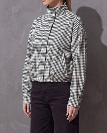 Side view of the Henley Jacket showing the soft blouson shape and full sleeves