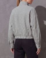 Back view of the Henley Jacket with stand collar, shoulder yoke and gathered hem