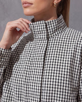 Close-up of the Henley Jacket stand collar and textured seersucker gingham