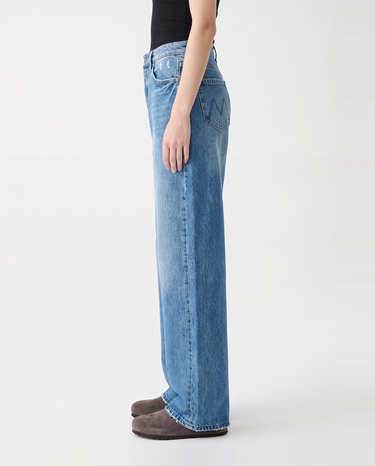 Side profile of Hallie Jeans showing the relaxed wide straight leg and raw hems