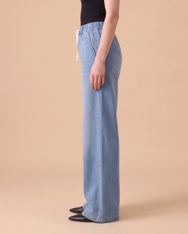 Isla Stretch Denim Jeans, side view showing the wide-leg drape