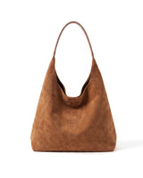 The Léa Slouch Tote in brown suede, front view on a pure white studio background