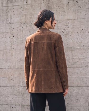 Back view of the dark brown Isla Faux Suede Jacket showing the tailored shoulder seams and straight hem