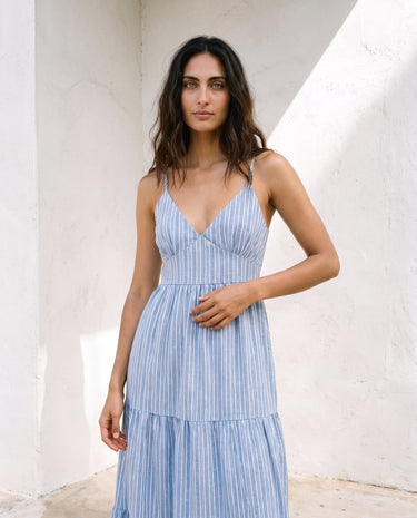 Isla Striped Summer Maxi Dress in blue stripe — V-neck strappy maxi dress, front view on model