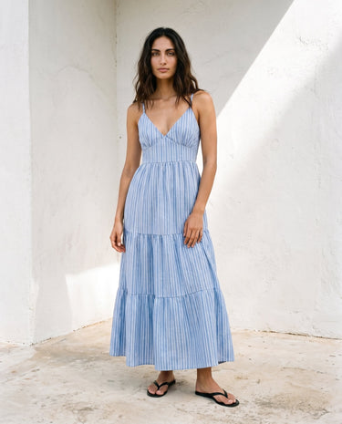 Isla Striped Summer Maxi Dress in blue stripe — sleeveless tiered maxi dress, front view on model