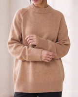 The Lauria wool blend knit sweater in camel — front view on model