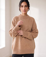 The Lauria wool blend knit sweater in camel — front three-quarter view on model
