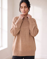 The Lauria wool blend knit sweater in camel — front view on model