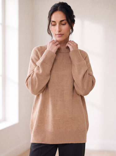 The Lauria wool blend knit sweater in camel — front view on model