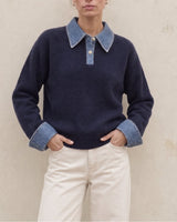 Leonie Denim Knit in navy with cream trousers — relaxed knit polo, front view on model