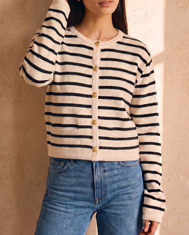 The Lilah cotton stripe cardigan in black stripes — front view on model