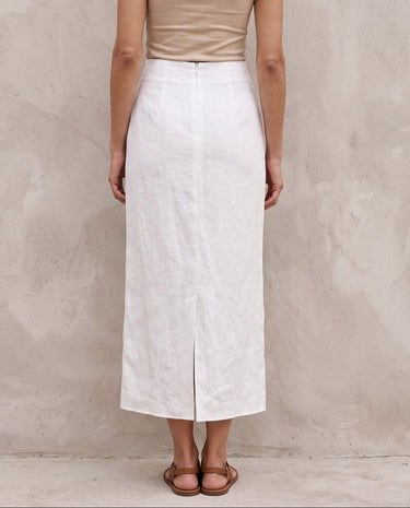 White midi skirt on model, side profile – Moriel Heritage
