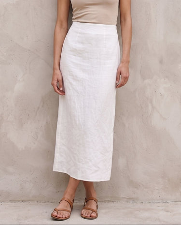 White midi skirt on model, back view – Moriel Heritage