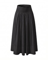 Lolie Skirt in black — high-waisted maxi skirt with a wide shirred waistband and full gathered skirt, flat-lay