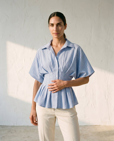 Blue striped Lori top on model, relaxed front view – Moriel Heritage