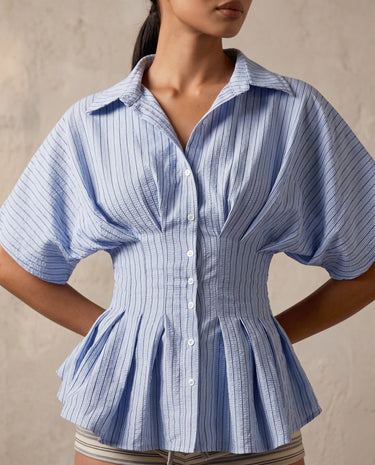 Blue striped Lori top on model, cinched waist detail – Moriel Heritage