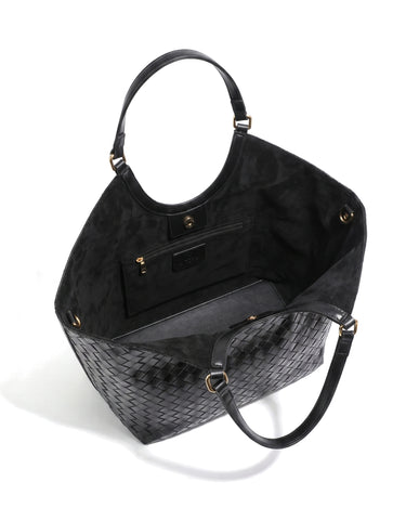 The Lucca Woven Tote in black, open top view showing the suede-lined interior and slip pockets