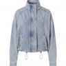 Marbella Denim Jacket — cropped light-wash denim jacket with stand collar and drawcord hem, flat lay