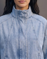 Marbella Denim Jacket — close-up of the tall stand collar and front panel seams