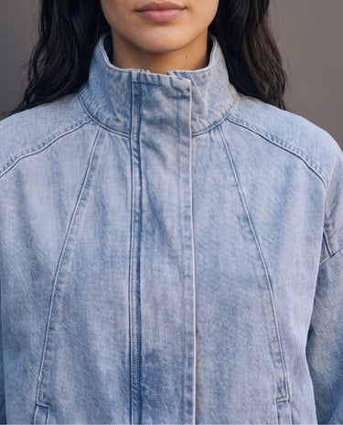 Marbella Denim Jacket — close-up of the tall stand collar and front panel seams