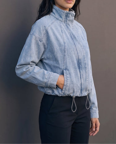 Marbella Denim Jacket — side three-quarter view on model, hand in pocket