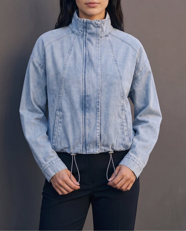 Marbella Denim Jacket — front view on model showing the cropped blouson shape