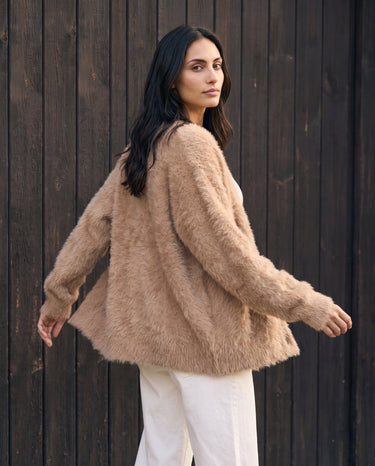 Maribel Knit Cardigan in khaki — back three-quarter view on model