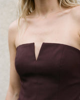 Close-up of the brown top's notched V neckline and centre seam – Moriel Heritage
