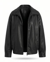 Marseille Faux Leather Jacket in black, flat lay front view with spread collar, zip front and elasticated hem