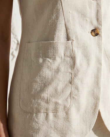 Cream tailored vest, pocket detail close-up – Moriel Heritage