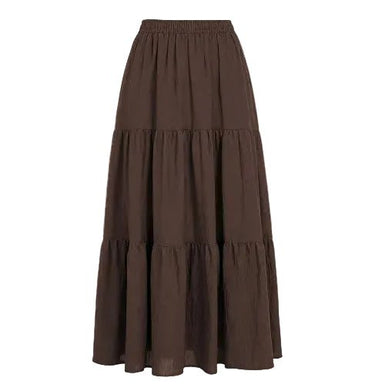 The Noemi A-Line Skirt in brown — tiered A-line maxi skirt with elastic waist, product flat-lay