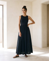 Noir Everyday Sleeveless Dress in black — sleeveless crew-neck maxi dress, front view on model