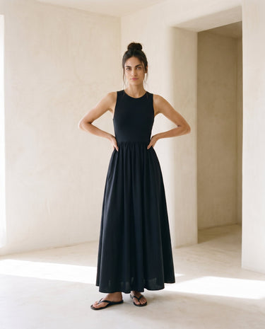 Noir Everyday Sleeveless Dress in black — crew-neck maxi dress, front view on model