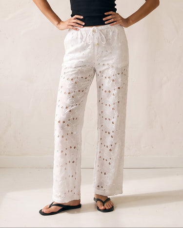 Noire Embroidered Straight Leg Pants in white — embroidered straight-leg trousers, front view on model