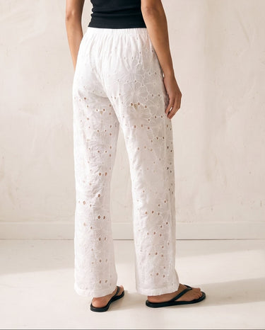 Noire Embroidered Straight Leg Pants in white — embroidered straight-leg trousers, back view on model