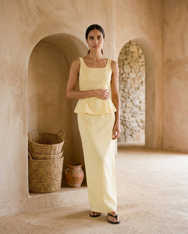 Yellow two-piece set on model, side view – Moriel Heritage