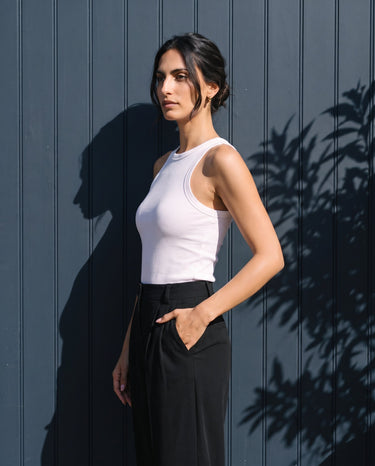 Side view of the white ribbed cotton tank showing the high armhole – Moriel Heritage