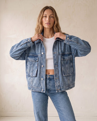 Oakley Denim Jacket in blue — oversized denim jacket with collar, front view on model