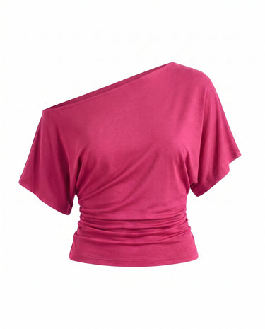 Odile Tee in pink — asymmetric off-shoulder draped knit top with dolman sleeves, flat-lay