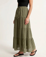 Olivia A-Line Skirt in sage green — tiered maxi skirt, front view on model