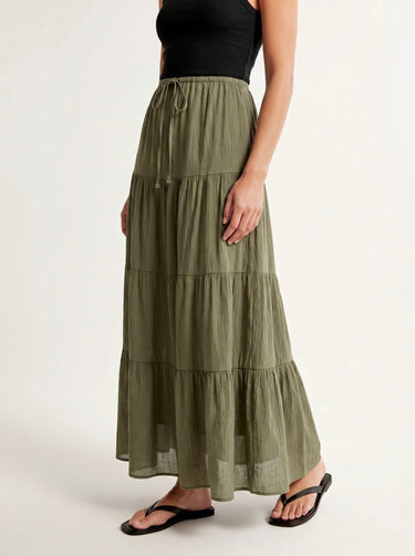 Olivia A-Line Skirt in sage green — tiered maxi skirt, front view on model