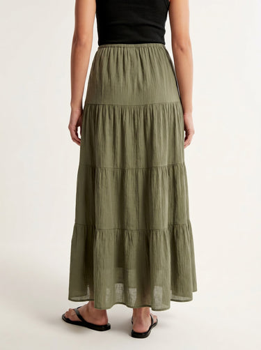 Olivia A-Line Skirt in sage green — tiered maxi skirt, back view on model